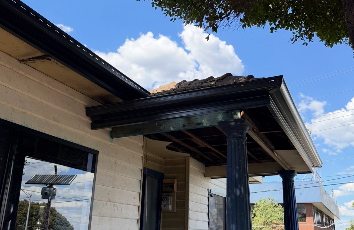 Completed black gutter replacement on a Melbourne house