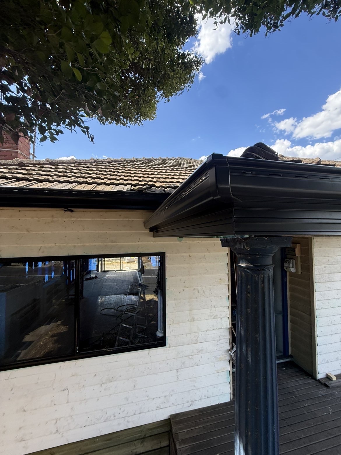 Completed black guttering installed on a Melbourne residential property